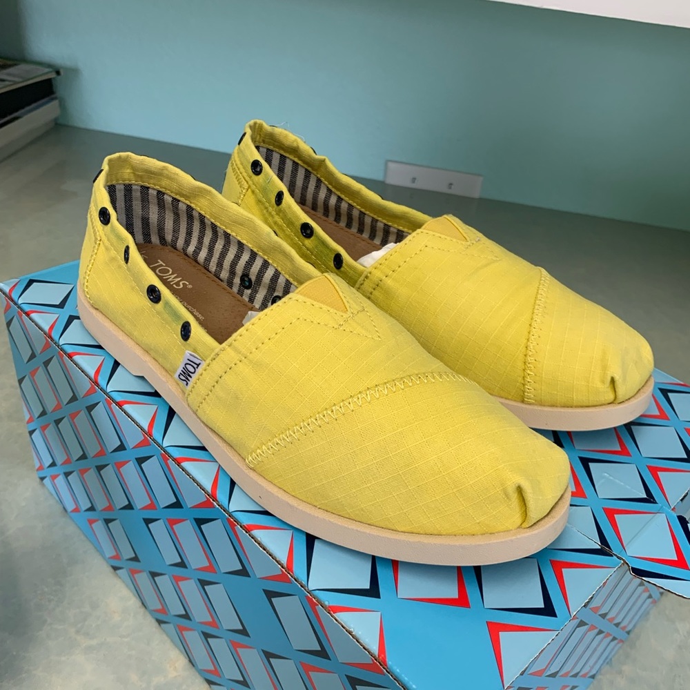 TOMS yellow shoes.